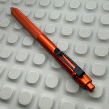 Load image into Gallery viewer, > Spoke Click Model CX: Orange Aluminum / Knurled Cylindrical Grip (black clip)