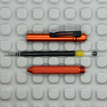 Load image into Gallery viewer, > Spoke Click Model CX: Orange Aluminum / Knurled Cylindrical Grip (black clip)