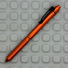 Load image into Gallery viewer, > Spoke Click Model CX: Orange Aluminum / Grooved Cylindrical Grip