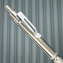 Load image into Gallery viewer, > Spoke Click Model CX: Shiny Titanium / Knurled Grip