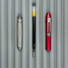 Load image into Gallery viewer, > Spoke Click Model CX: Red Aluminum / Matte Titanium Knurled Grip