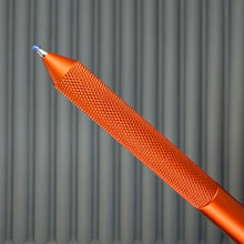 Load image into Gallery viewer, > Spoke Click Model CX: Lava Orange Aluminum / Knurled Cylindrical Grip (silver clip)