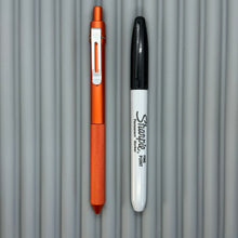 Load image into Gallery viewer, > Spoke Click Model CX: Lava Orange Aluminum / Knurled Cylindrical Grip (silver clip)