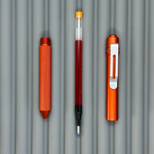 Load image into Gallery viewer, > Spoke Click Model CX: Lava Orange Aluminum / Knurled Cylindrical Grip (silver clip)