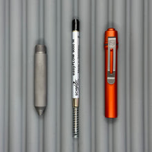 Load image into Gallery viewer, > Spoke Click Model C: Aluminum, Lava Orange / Matte Titanium Knurled Grip