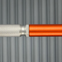 Load image into Gallery viewer, > Spoke Click Model CX: Lava Orange Aluminum / Matte Titanium Knurled Grip