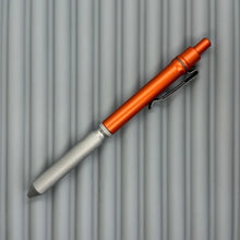 Load image into Gallery viewer, > Spoke Click Model CX: Lava Orange Aluminum / Matte Titanium Knurled Grip