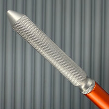 Load image into Gallery viewer, > Spoke Click Model CX: Lava Orange Aluminum / Matte Titanium Knurled Grip