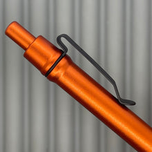 Load image into Gallery viewer, > Spoke Click Model C: Aluminum, Lava Orange / Knurled Grip