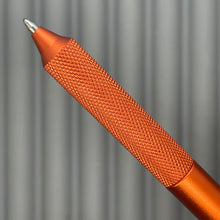 Load image into Gallery viewer, > Spoke Click Model C: Aluminum, Lava Orange / Knurled Grip
