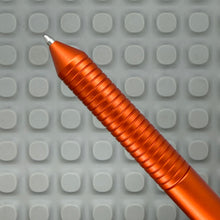 Load image into Gallery viewer, &gt; Spoke Click Model C: Aluminum, Lava Orange / Grooved Cylindrical Grip