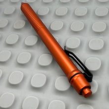 Load image into Gallery viewer, &gt; Spoke Click Model C: Aluminum, Lava Orange / Grooved Cylindrical Grip