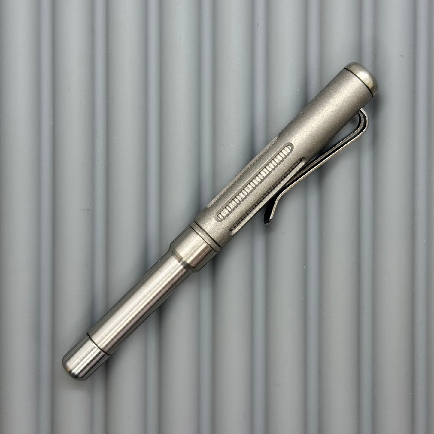 Roady  / Shiny & Matte Titanium with Slot Cap and Groove Grip