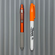 Load image into Gallery viewer, > Spoke Click Model C: Orange Lava Aluminum / Matte Titanium Peak Knurled Grip