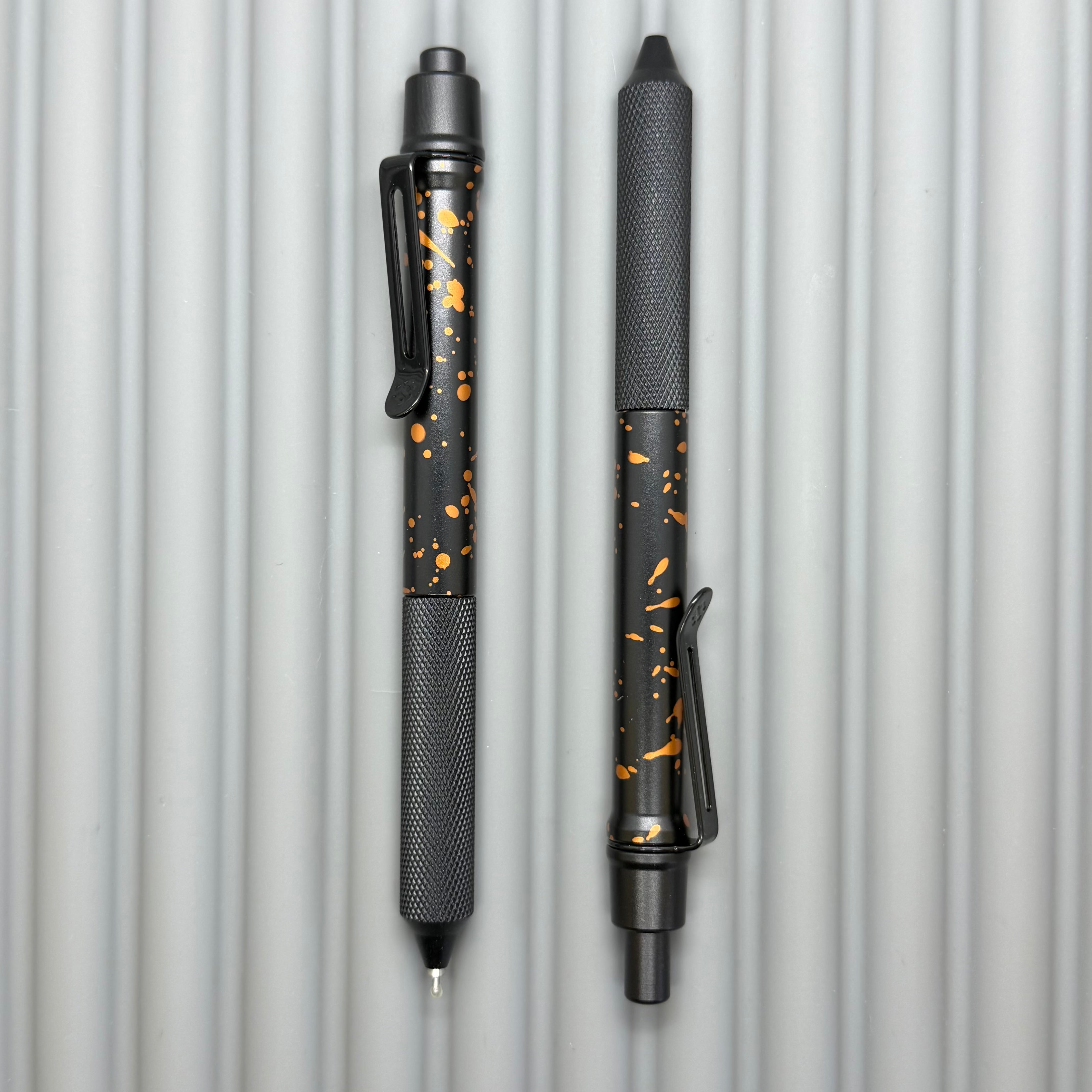 Spoke Click Model C: Black with Orange Lava Splash, Aluminum