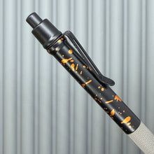 Load image into Gallery viewer, > Spoke Click Model C: Black with Orange Lava Splash, Aluminum / Matte Titanium Peak Knurled Grip