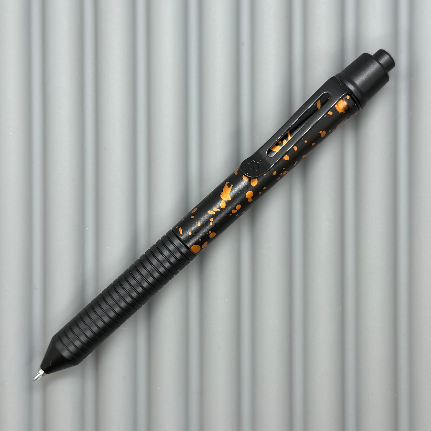 > Spoke Click Model C: Black with Orange Lava Splash, Aluminum / Black Aluminum Grooved Grip