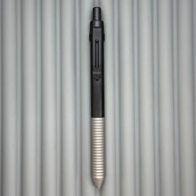 Load image into Gallery viewer, &gt; Spoke Click Model C: Black Aluminum Barrel / Matte Titanium Grooved Grip