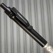 Load image into Gallery viewer, &gt; Spoke Click Model CX: Black Aluminum Barrel / Matte Titanium Grooved Grip