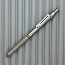 Load image into Gallery viewer, > Spoke Click Model CX: Gunmetal Ano Aluminum Barrel / Matte Titanium Grooved Grip