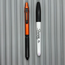 Load image into Gallery viewer, &gt; Spoke Click Model CX: Orange Aluminum / Black Grooved Cylindrical Grip