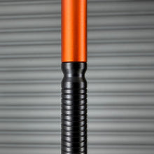 Load image into Gallery viewer, &gt; Spoke Click Model CX: Orange Aluminum / Black Grooved Cylindrical Grip