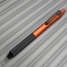 Load image into Gallery viewer, &gt; Spoke Click Model C: Aluminum, Lava Orange / Black Knurled Grip