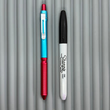 Load image into Gallery viewer, &gt; Spoke Click Model CX: Aluminum, Cyan/Red Grooved Cylindrical Grip