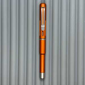 Roady XL / Slot Lava Orange - matte Titanium knurl grip