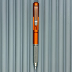 Roady XL / Slot Lava Orange - matte Titanium knurl grip