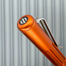 Load image into Gallery viewer, Roady XL / Slot Lava Orange - matte Titanium milligroove grip