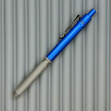 Load image into Gallery viewer, &gt; Spoke Click Model CX: Blue Aluminum / Matte Titanium Knurled Grip