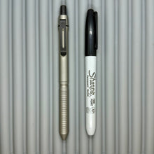Load image into Gallery viewer, &gt; Spoke Click Model CX: Matte Titanium / Grooved Grip (black accents)