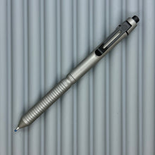 Load image into Gallery viewer, &gt; Spoke Click Model CX: Matte Titanium / Grooved Grip (black accents)