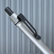 Load image into Gallery viewer, &gt; Spoke Click Model CX: Matte Titanium / Grooved Grip (black accents)