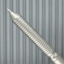 Load image into Gallery viewer, &gt; Spoke Click Model CX: Matte Titanium / Grooved Grip (black accents)