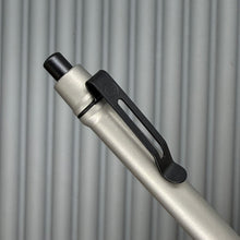 Load image into Gallery viewer, &gt; Spoke Click Model C: Matte Titanium /  Grooved Grip (black accents)