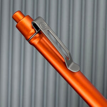 Load image into Gallery viewer, &gt; Spoke Click Model C: Aluminum, Lava Orange / Matte Titanium Grooved Grip
