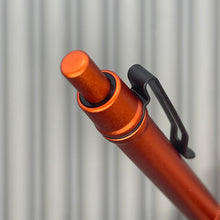 Load image into Gallery viewer, &gt; Spoke Click Model C: Aluminum, Lava Orange / Knurled Grip